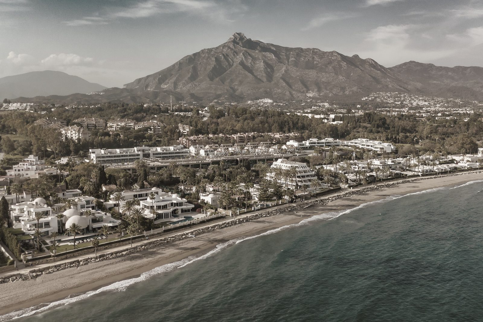 Marbella coastline beneath La Concha, sepia-treated